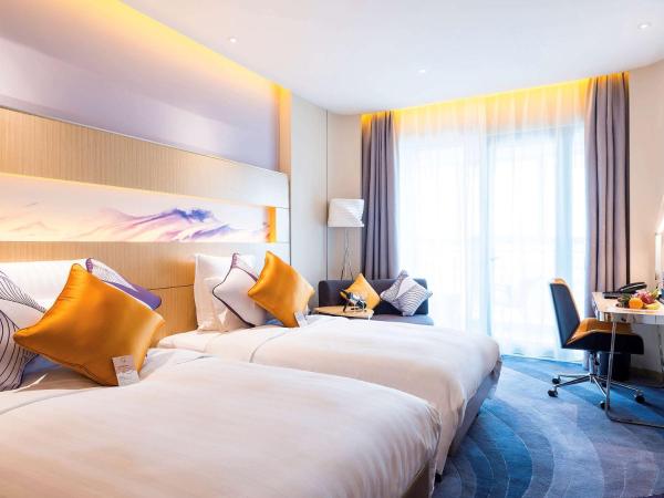 Novotel Suzhou Sip : photo 2 de la chambre chambre lits jumeaux deluxe