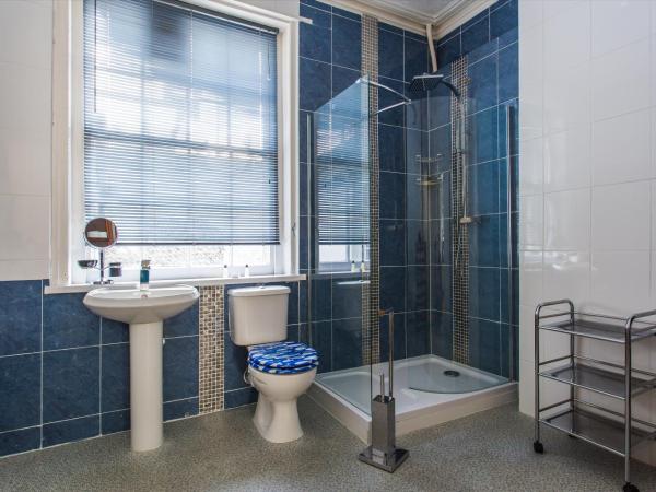 Brighton Surf Guest House : photo 9 de la chambre hébergement grand lit king-size premier