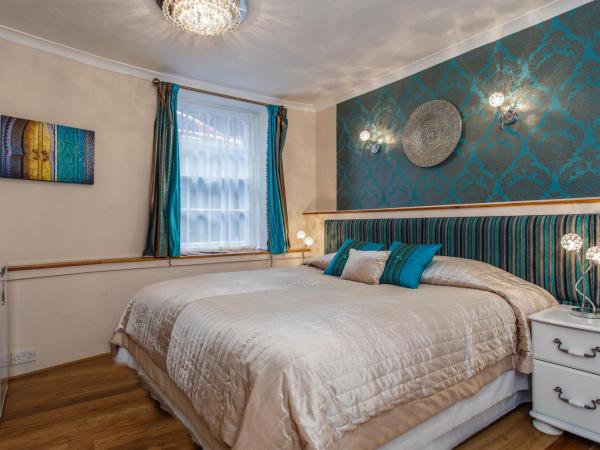 Brighton Surf Guest House : photo 4 de la chambre hébergement grand lit king-size deluxe