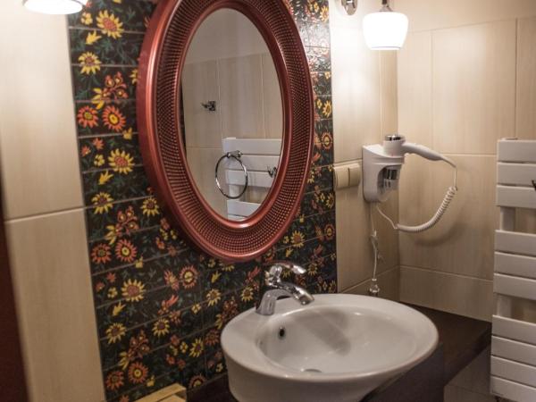 Apartamenty Siedem Komnat Siedmiu Mistrzów : photo 7 de la chambre chambre double ou lits jumeaux