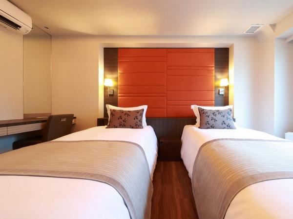 Hotel Sakura Suite Osaka Juso : photo 1 de la chambre chambre lits jumeaux supérieure - non-fumeurs