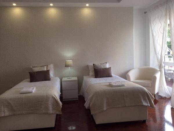 4U Lisbon IV Guesthouse Airport : photo 5 de la chambre chambre familiale deluxe