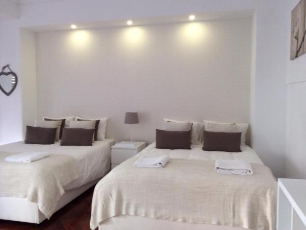 4U Lisbon IV Guesthouse Airport : photo 1 de la chambre chambre familiale deluxe