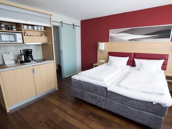 Bonnox Boardinghouse & Hotel : photo 2 de la chambre  appartement basique