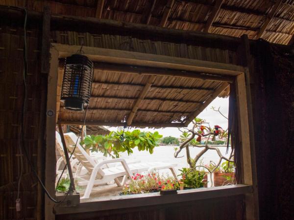 New Phiman Riverview Guesthouse : photo 6 de la chambre cottage - vue sur jardin