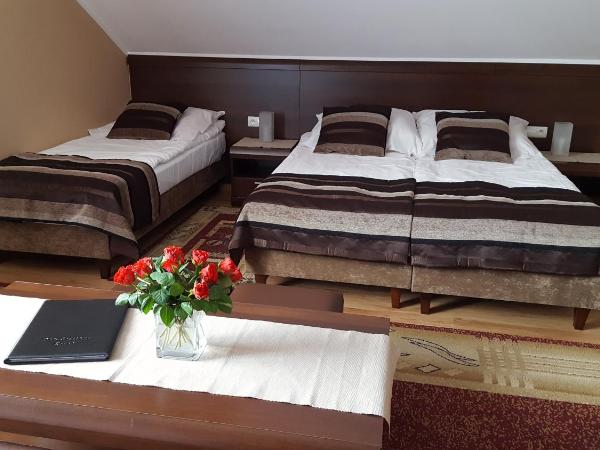 Dom Gościnny Korab : photo 4 de la chambre chambre quadruple avec salle de bains