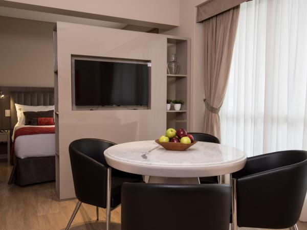 ARC Arenales Studios & Suites : photo 2 de la chambre suite double