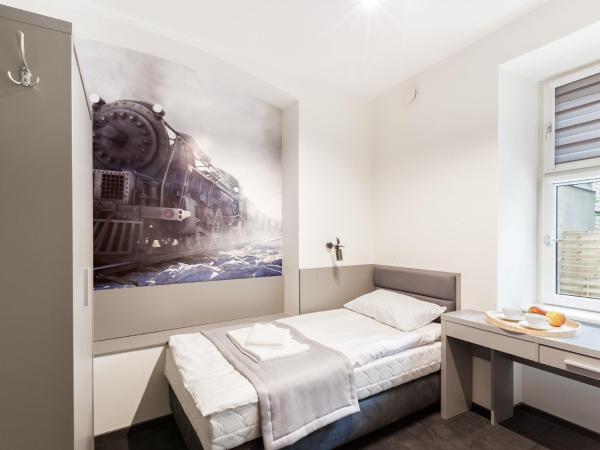 Cinema Hostel : photo 5 de la chambre chambre lits jumeaux avec salle de bains privative