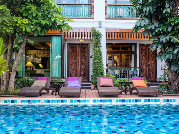 Villa Sirilanna Hotel : photo 4 de la chambre chambre lit king-size - vue sur piscine