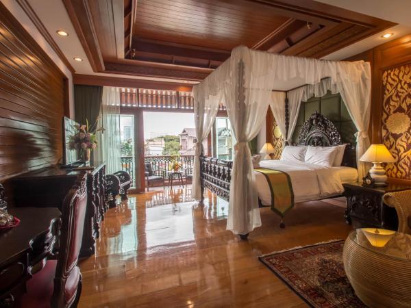 Villa Sirilanna Hotel : photo 5 de la chambre suite junior lit king-size lanna avec baignoire spa