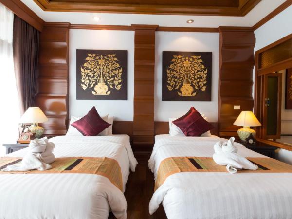 Villa Sirilanna Hotel : photo 2 de la chambre chambre lits jumeaux de luxe avec baignoire spa et balcon privé