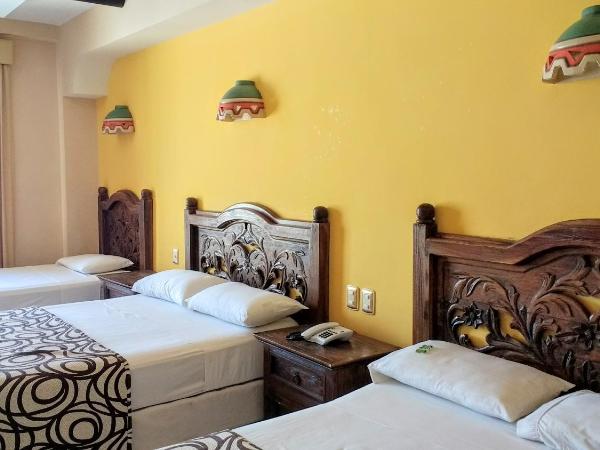 Suites Flamboyanes : photo 5 de la chambre chambre triple