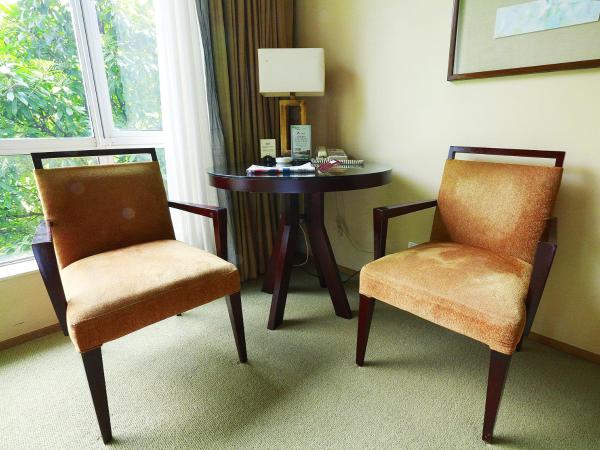 Jinling Resort Nanjing : photo 4 de la chambre chambre lits jumeaux - vue sur jardin