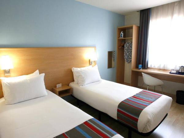 Travelodge Torrelaguna : photo 1 de la chambre chambre lits jumeaux