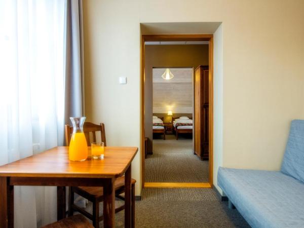 Rezydencja Sienkiewiczówka : photo 5 de la chambre chambre lits jumeaux premium