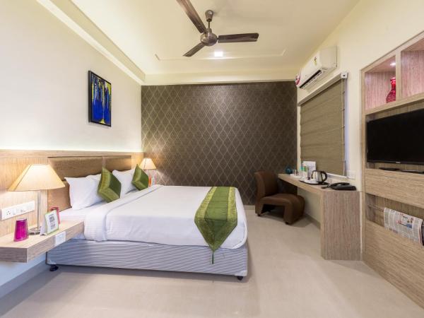 Treebo Nestlay Casa : photo 1 de la chambre [sanitized] deluxe double or twin room