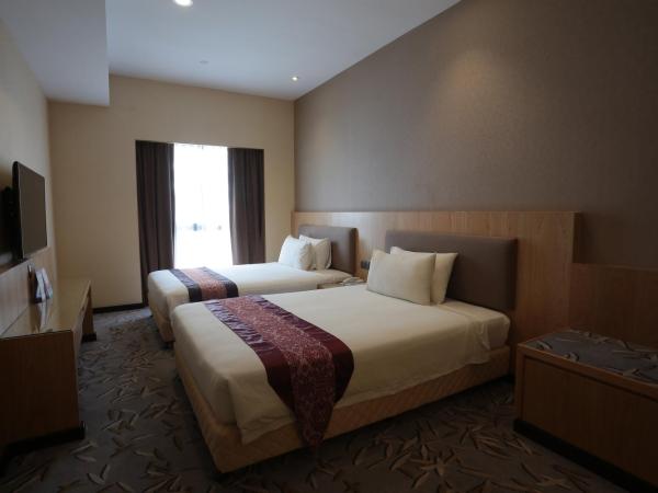 Imperial Riverbank Hotel Kuching : photo 3 de la chambre chambre lits jumeaux deluxe