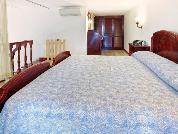 Parco Smeraldo Appartamenti : photo 6 de la chambre appartement 1 chambre supérieur en duplex – vue sur jardin