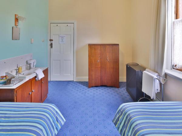 Astor Private Hotel : photo 3 de la chambre chambre simple standard avec salle de bains commune