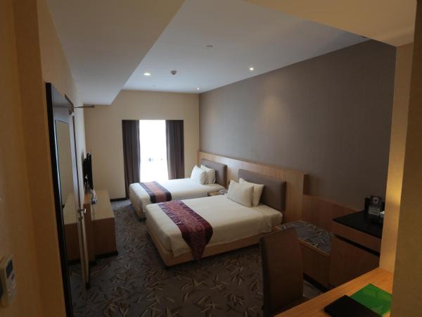 Imperial Riverbank Hotel Kuching : photo 2 de la chambre chambre lits jumeaux deluxe