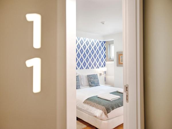 Dear Lisbon - Charming House : photo 2 de la chambre chambre double ou lits jumeaux - vue sur rue