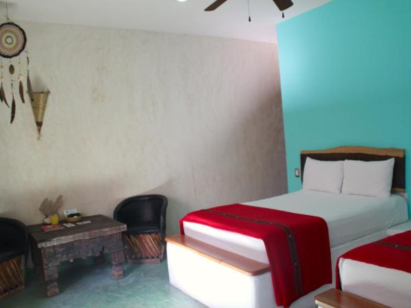 Corazon De Jade Tulum : photo 3 de la chambre room with two queen beds and private bathroom