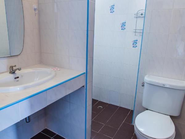 Hugs Guesthouse : photo 1 de la chambre chambre triple deluxe avec balcon