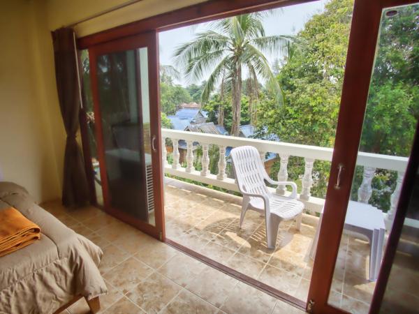 Hugs Guesthouse : photo 10 de la chambre chambre triple deluxe avec balcon