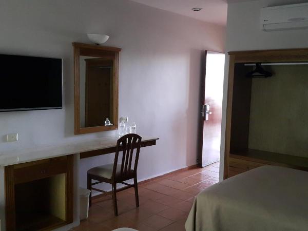 Tecnohotel Mérida Norte : photo 6 de la chambre chambre double ou lits jumeaux - vue sur jardin