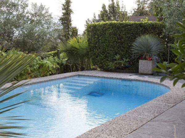 Boutique Hotel Albergo Brione : photo 5 de la chambre chambre double deluxe - vue sur jardin