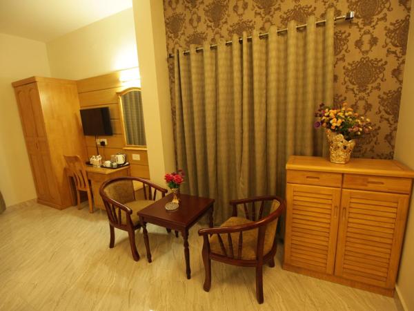 Grand Cascade Chennai : photo 7 de la chambre chambre lit king-size