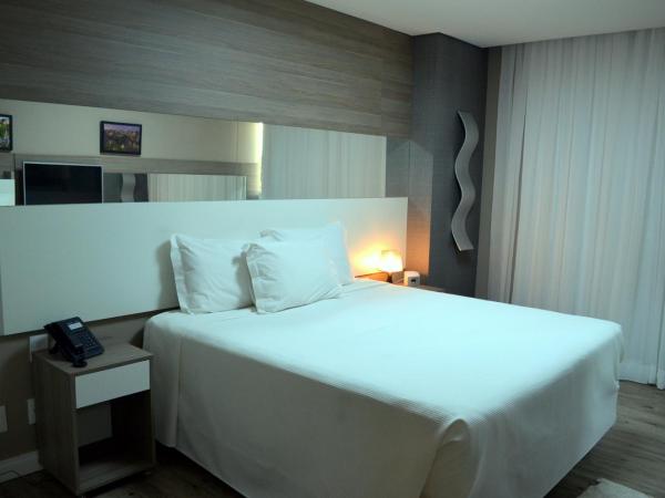 Ville Celestine Condo Hotel e Eventos : photo 1 de la chambre chambre lit queen-size deluxe