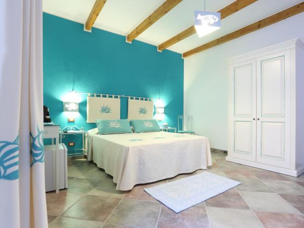 Palau De Rosa : photo 4 de la chambre chambre quadruple avec salle de bains privative