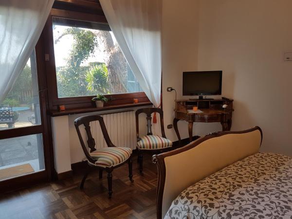 La Tolda - La Vista Clara : photo 5 de la chambre chambre lit king-size - vue sur jardin