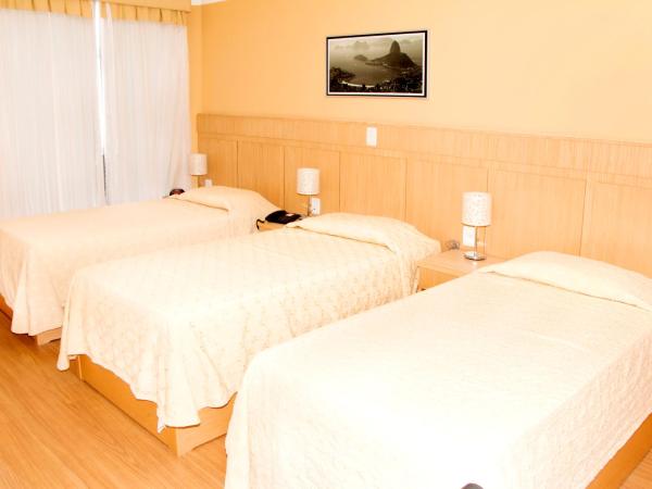 Hotel Pouso Real : photo 2 de la chambre chambre quadruple de luxe