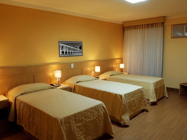 Hotel Pouso Real : photo 5 de la chambre chambre quadruple de luxe