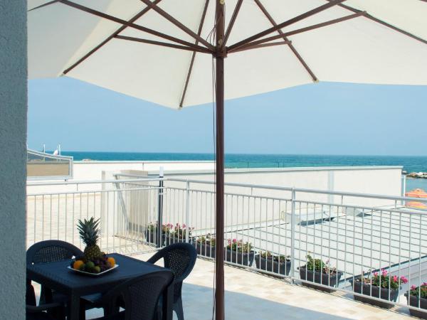 Hotel & Residence Cavalluccio Marino : photo 2 de la chambre suite supérieure