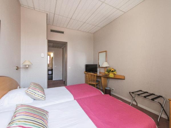 Hôtel Vacances Bleues Balmoral : photo 1 de la chambre chambre double ou lits jumeaux - vue sur ville