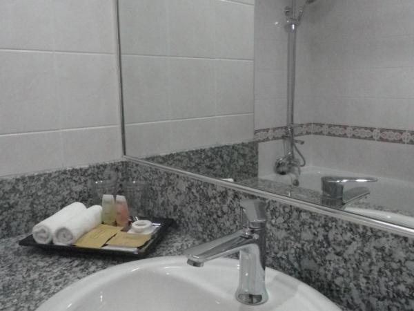 Hotel Grand Continental Kuching : photo 7 de la chambre chambre double ou lits jumeaux premium