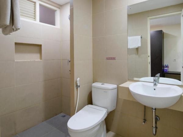 Grand Kebonsari Guesthouse : photo 10 de la chambre chambre lit king-size deluxe