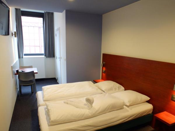Century Hotel Antwerpen Centrum : photo 2 de la chambre chambre lits jumeaux confort