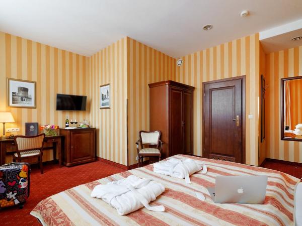 Hotel Wolne Miasto Old Town Gdańsk : photo 3 de la chambre chambre deluxe double ou lits jumeaux