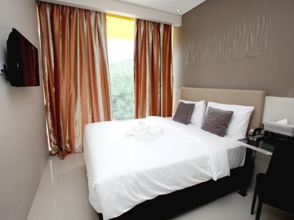 Verse Lite Hotel Gajah Mada : photo 2 de la chambre chambre supérieure lit queen-size