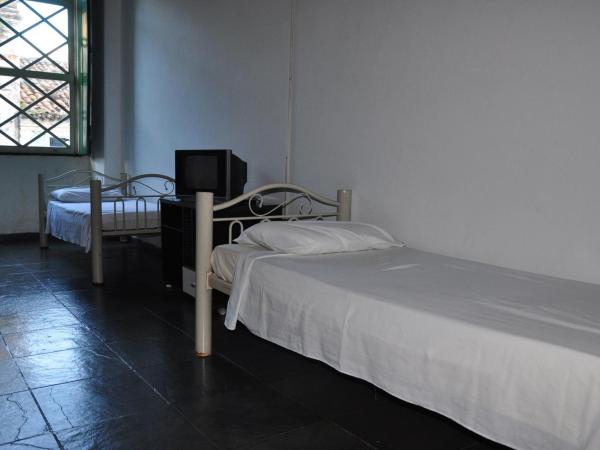 Pousada Solar dos Romanos : photo 2 de la chambre chambre triple avec ventilateur
