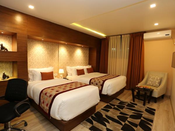 Yatri Suites and Spa : photo 9 de la chambre super deluxe room - free airport pickup or drop, 15% off on food & beverage, 20% off on spa