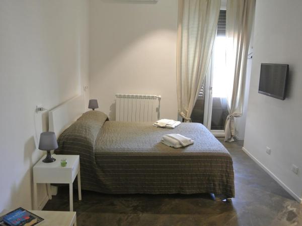 Palermo Rooms : photo 6 de la chambre chambre triple supérieure