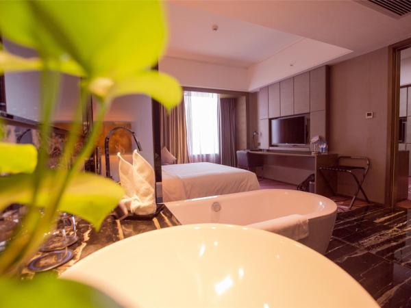 La Perle International Hotel - Free shuttle between hotel and Exhibition Center during Canton Fair & Exhibitor registration Counter : photo 6 de la chambre suite affaires