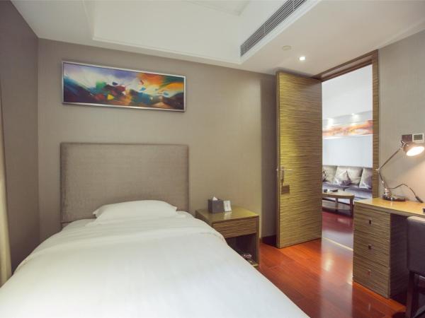 La Perle International Hotel - Free shuttle between hotel and Exhibition Center during Canton Fair & Exhibitor registration Counter : photo 4 de la chambre suite familiale deluxe