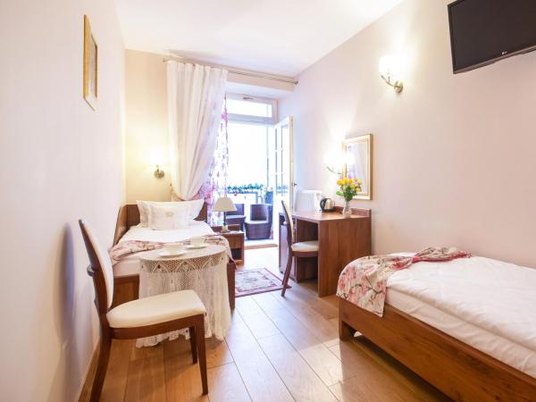 Aparthotel Grodzka 21 : photo 8 de la chambre chambre lits jumeaux