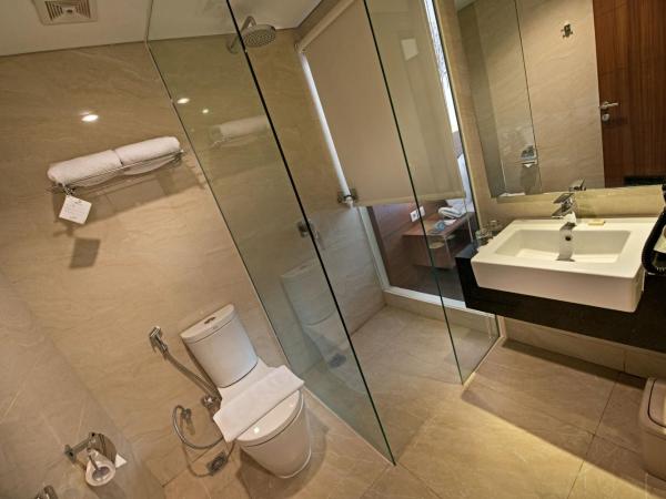 Grand Whiz Poins Simatupang Jakarta : photo 4 de la chambre chambre lits jumeaux deluxe